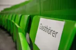 Hörsaal mit Schild Gasthörer
