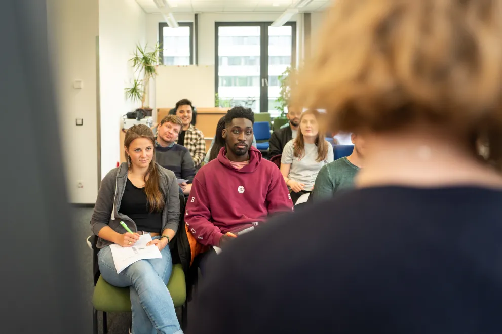 Teilnehmer bei Workshop / Vortrag.