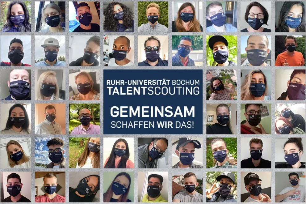 Zoom-Bildschirm mit vielen Menschen mit Masken und der mittigen Schrift "Gemeinsam schaffen wir das"
