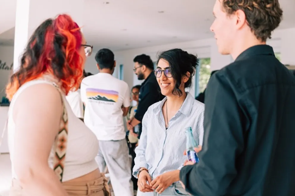 International students talking at "Your Future in NRW" in Bochum